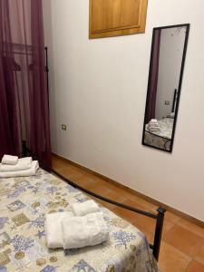 Postel nebo postele na pokoji v ubytování Le Due Porte