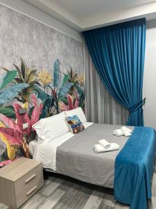 Posteľ alebo postele v izbe v ubytovaní B&B VIVA NAPOLI