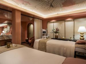 a hotel room with two beds in a room at Boho Club in Marbella