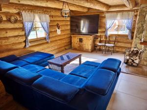 A seating area at Zrub Liptovec