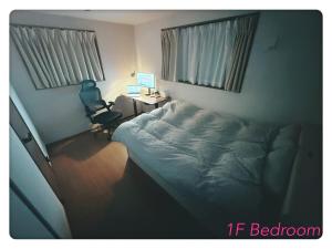 En eller flere senge i et værelse på Hao Bros Home Gemini B + 24 billeder