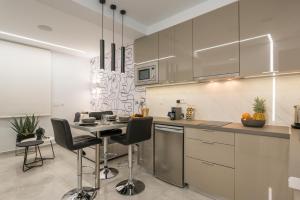 Η κουζίνα ή μικρή κουζίνα στο Pi Suite Project Smart Living