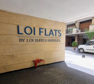 a building with a sign on the side of it at Loi Flats Buenos Aires in Buenos Aires