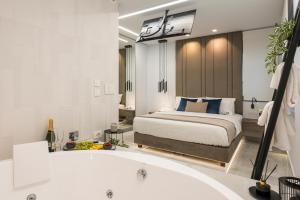 Ένα ή περισσότερα κρεβάτια σε δωμάτιο στο Pi Suite Project Smart Living