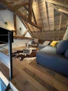 Posezení v ubytování Loft cosy, bain à bulle et garage privé