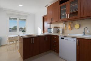 Η κουζίνα ή μικρή κουζίνα στο Apartoyou - Chalet & Pool
