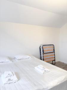Postel nebo postele na pokoji v ubytování Säffle Suites by Svaneholm Hotel