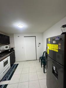 Una cocina o zona de cocina en Bamuka Hostal