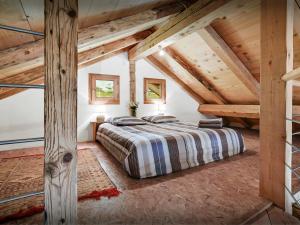 Postel nebo postele na pokoji v ubytování Chalet Arsene et Lea - OVO Network