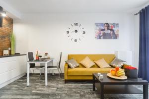 Część wypoczynkowa w obiekcie Lumina cozy apartments Manufaktura