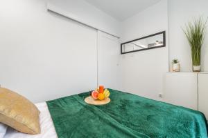 Łóżko lub łóżka w pokoju w obiekcie Lumina cozy apartments Manufaktura