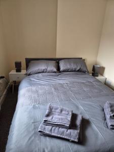 Ένα ή περισσότερα κρεβάτια σε δωμάτιο στο Harrogate central apartment