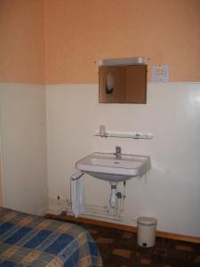 Ванная комната в Hotel L'Aiglon