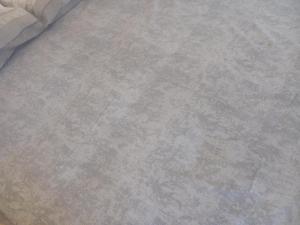 un primer plano de una sábana con en Apartman MDj, en Žarkovo 1 foto más