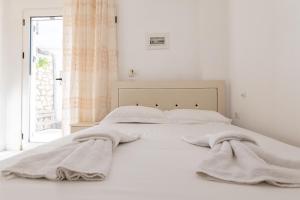 Cama ou camas em um quarto em Vila Celi