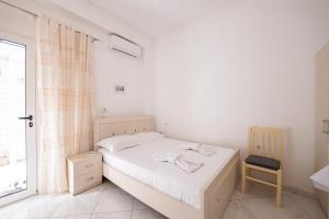Cama ou camas em um quarto em Vila Celi