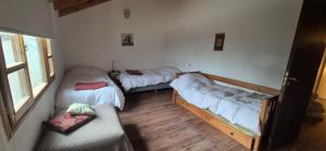 Ένα ή περισσότερα κρεβάτια σε δωμάτιο στο ColinaHouse