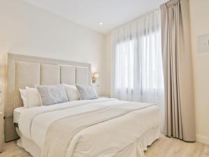 Postel nebo postele na pokoji v ubytování Sitges Spaces Urban Beach Flat- 3 Bedrooms, 3 Bathrooms, Huge Terrace, Near Beach