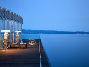 a view of a deck with a view of the water at Radisson Blu Resort & Spa in Split