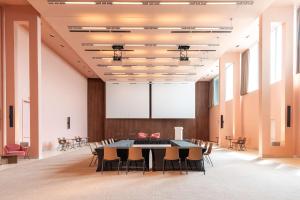 a large conference room with a table and chairs at Radisson Blu Resort & Spa in Split