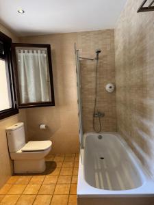 Koupelna v ubytování Hotel Guara Inlukā