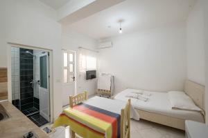 Cama ou camas em um quarto em Vila Celi