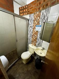 Koupelna v ubytování Hotel Mawill