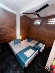 Postel nebo postele na pokoji v ubytování Hotel Mawill