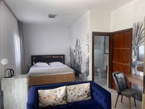 Postel nebo postele na pokoji v ubytování La Maison Blanche