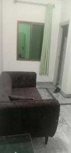 Posezení v ubytování Gujrat Hotel