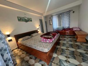 Postel nebo postele na pokoji v ubytování Pradhan Homestay Mirik - Homestay beside Mirik Lake