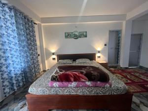 Postel nebo postele na pokoji v ubytování Pradhan Homestay Mirik - Homestay beside Mirik Lake