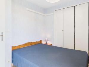 Posteľ alebo postele v izbe v ubytovaní Appartement T2 cabine climatisé, à 400m de la plage, proche commerces, 2ème étage, parking inclus - FR-1-423-272