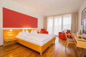 Postel nebo postele na pokoji v ubytování Allegria Resort Stegersbach - Allegria Hotel