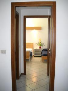 Postel nebo postele na pokoji v ubytování Hotel Rosmary