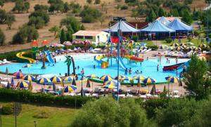a large water park with a bunch of people in it at Casa Matilde - Villa San Pietro in Villa San Pietro