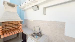 Η κουζίνα ή μικρή κουζίνα στο Casa Lourdes Raya Frigiliana