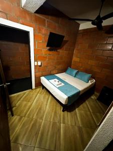 Postel nebo postele na pokoji v ubytování Hotel Mawill