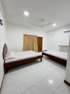 Letto o letti in una camera di Seafood king hostel