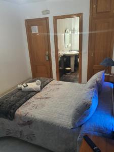 Łóżko lub łóżka w pokoju w obiekcie Pension A Barca