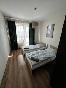 Posteľ alebo postele v izbe v ubytovaní Apartament Gorzów
