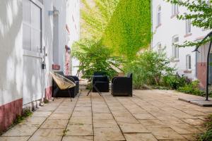 Ein Garten an der Unterkunft Home by Doni I serviced apartments I ruhig I zentral nahe RMCC, Staatsheater & Landtag