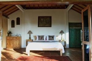 A bed or beds in a room at Bangsring Breeze