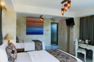 A bed or beds in a room at Bangsring Breeze