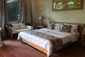 A bed or beds in a room at Bangsring Breeze