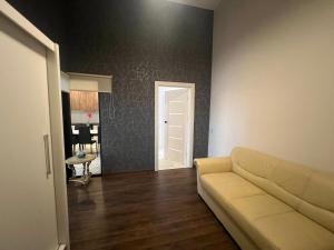 Гостиная зона в Lofto apartamentai senamiestyje +5 фотографий