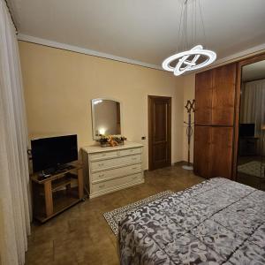 TV o dispositivi per l'intrattenimento presso Casa Luciana - Comfort a Lucca con Parcheggio
