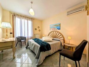 Katil atau katil-katil dalam bilik di Sole Del Salento Home -Puglia