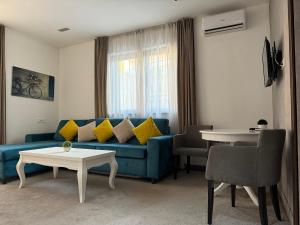 Posezení v ubytování Deluxe Nortel Hotel