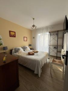 Postel nebo postele na pokoji v ubytování Villa de charme plain pied 3 chambres décorée avec goût bel extérieur